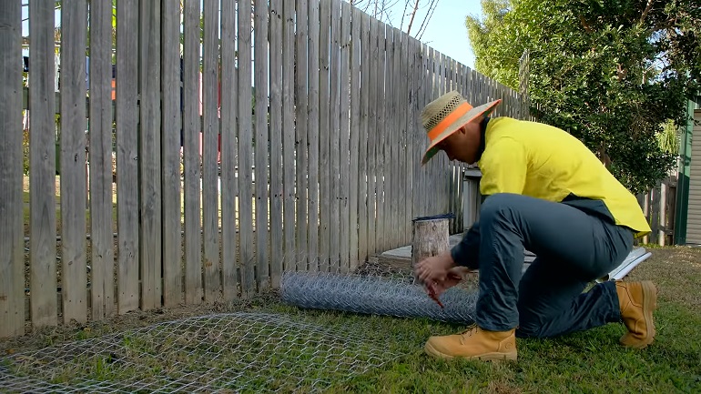 how to dog proof fence